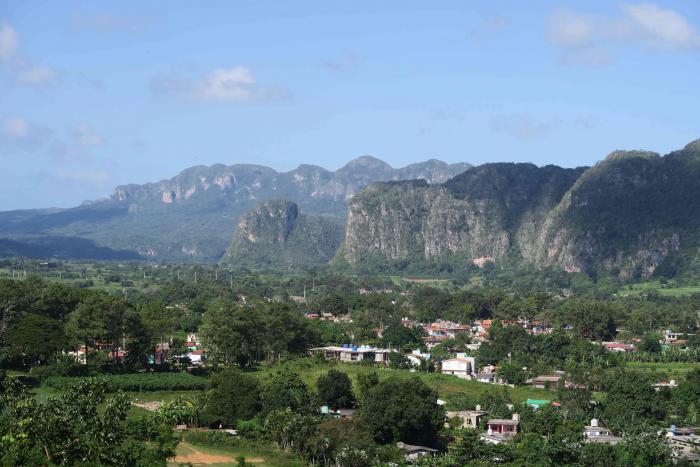 Viñales valley in the Province of Pinar del Rio is known worldwide for the production of the finest cigars and for its typical geological steep hills, the Mogotes. Pinar del Rio, Cuba.